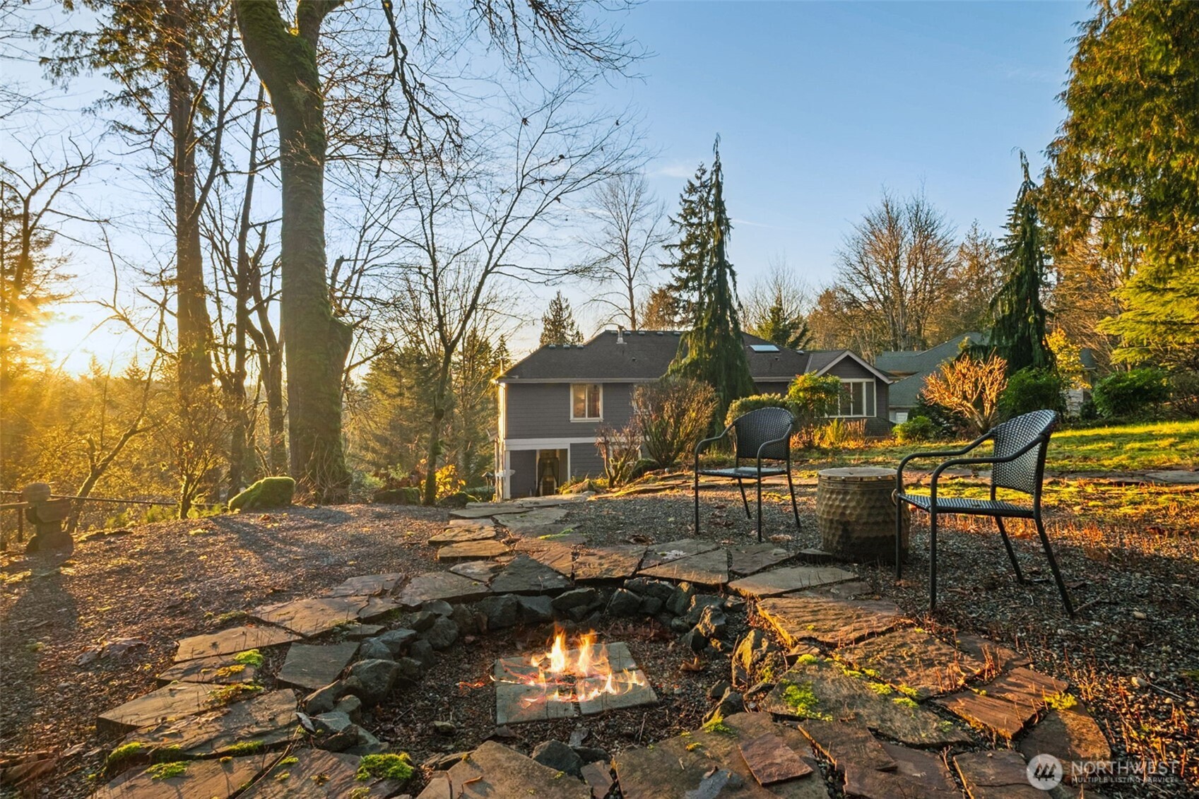 25913 Southeast 159th Street Issaquah, WA 98027 - Photo 23 of 40 a view of a yard with a house in the background
