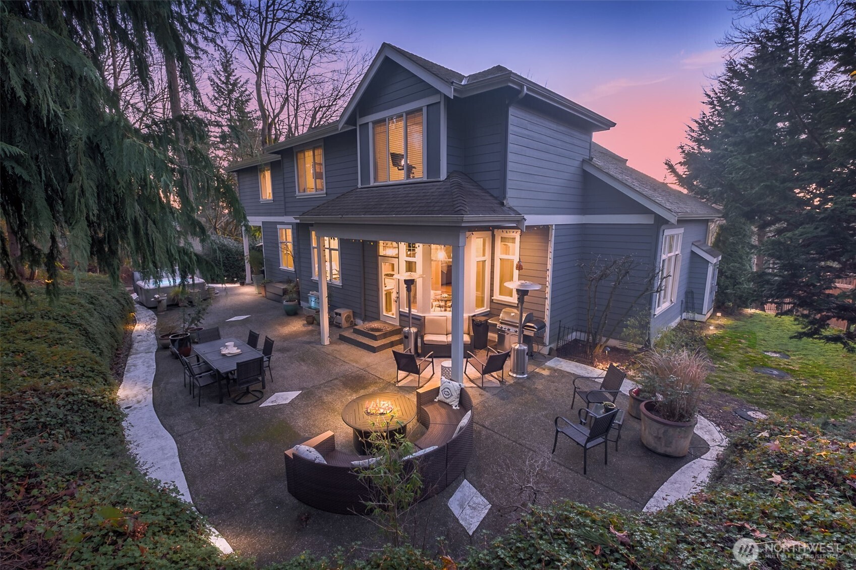 25913 Southeast 159th Street Issaquah, WA 98027 - Photo 23 of 40 a view of a patio with couches table and chairs and potted plants