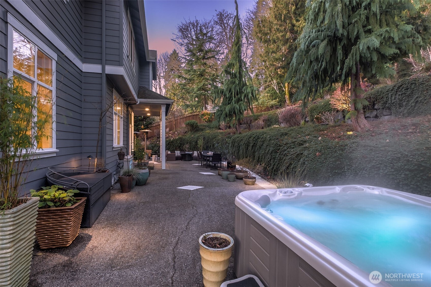 25913 Southeast 159th Street Issaquah, WA 98027 - Photo 36 of 40 a view of a patio with chairs and potted plants