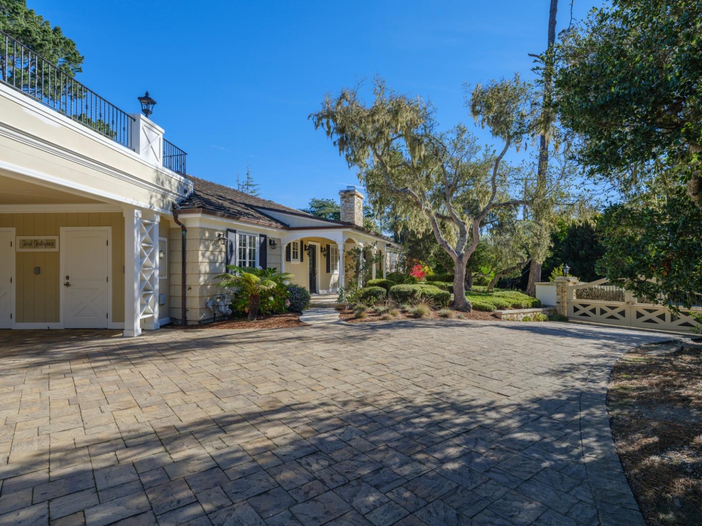 1471 Riata Road Pebble Beach, CA 93953 - Photo 3 of 29 a view of a house with a yard
