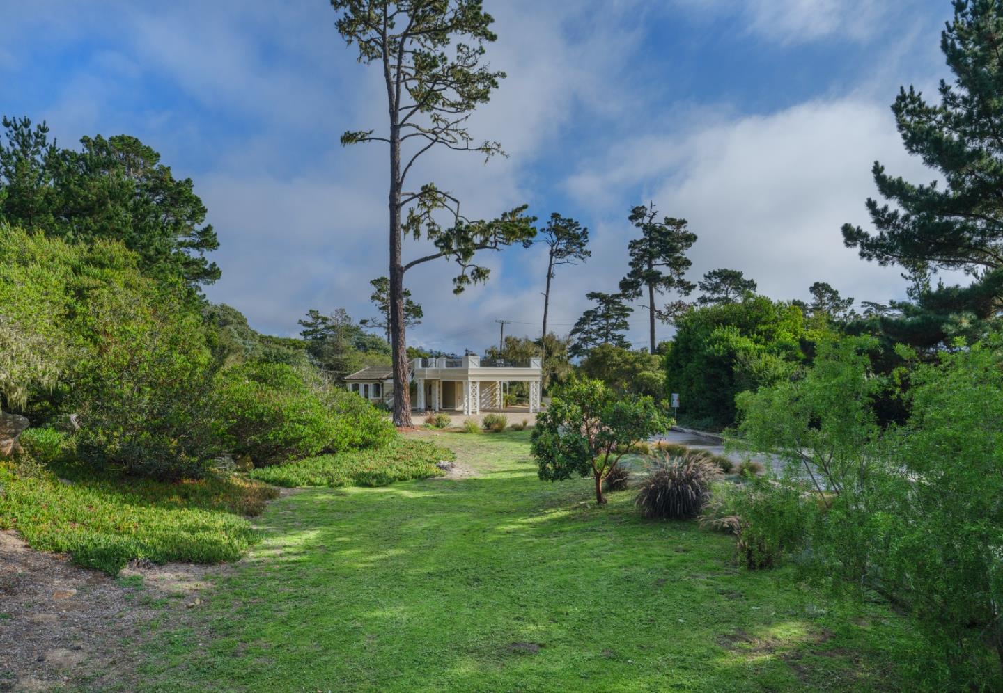 1471 Riata Road Pebble Beach, CA 93953 - Photo 25 of 29 an aerial view of a house with a yard