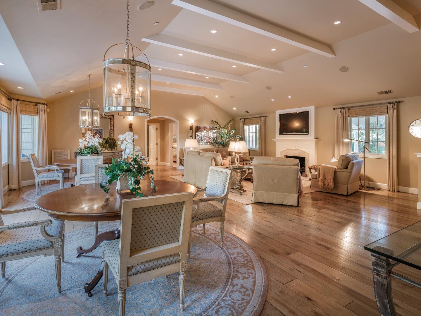 1471 Riata Road Pebble Beach, CA 93953 - Photo 5 of 29 a living room with fireplace furniture and a chandelier