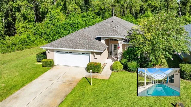 a aerial view of a house with table and chairs