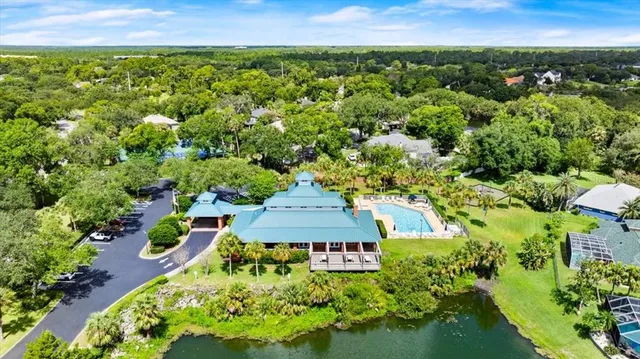 swimming pool with table and chairs