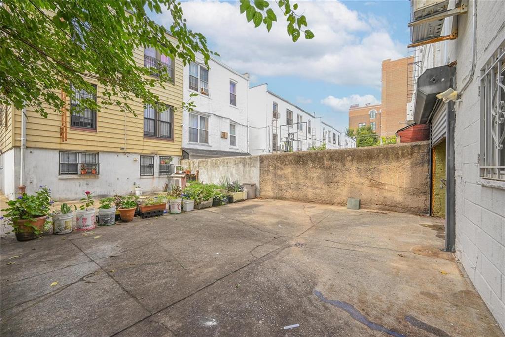 1270 68th Street Brooklyn, NY 11219 - Photo 17 of 20 an outdoor view of a building