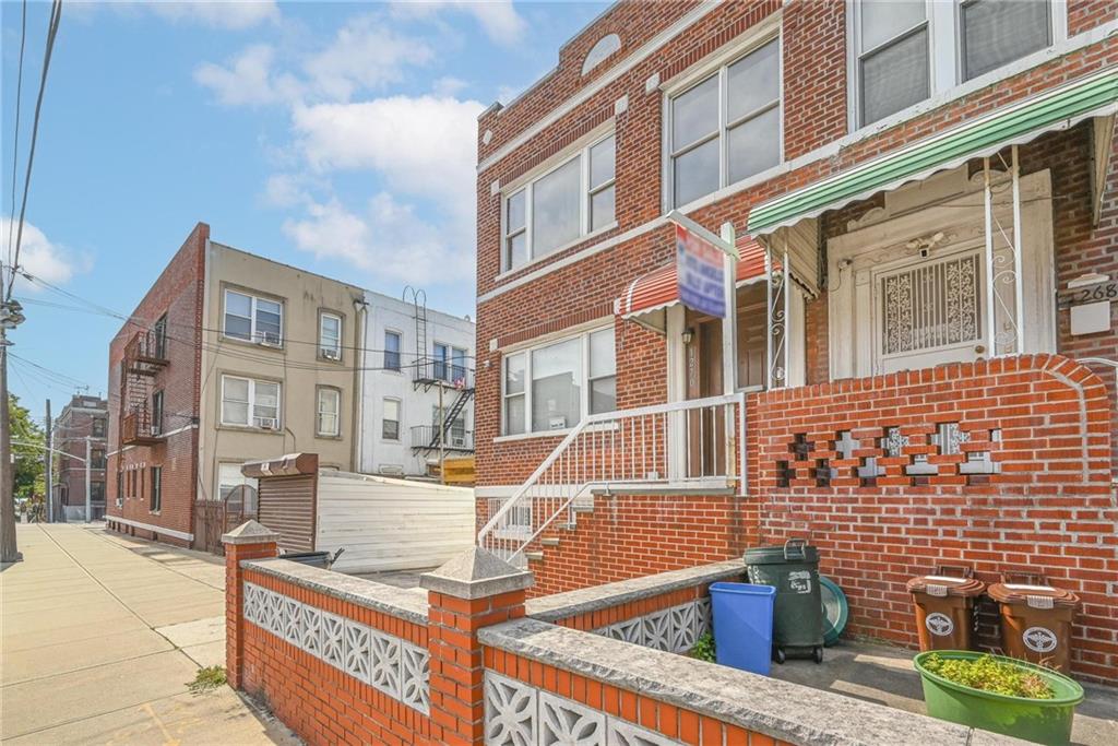 1270 68th Street Brooklyn, NY 11219 - Photo 2 of 20 a view of a building with many windows