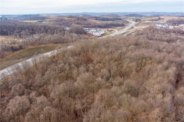 a view of a yard with an outdoor space