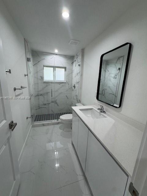 3127 Northwest 60th Street Miami, FL 33142 - Photo 11 of 13 a bathroom with a sink a toilet and mirror
