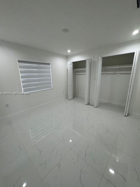 3127 Northwest 60th Street Miami, FL 33142 - Photo 12 of 13 a view of an empty room with a window