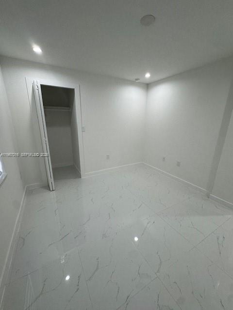 3127 Northwest 60th Street Miami, FL 33142 - Photo 7 of 13 an empty room with a bathroom