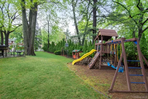 a house with garden in front of it