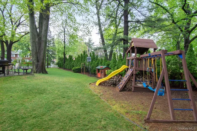 a house with garden in front of it