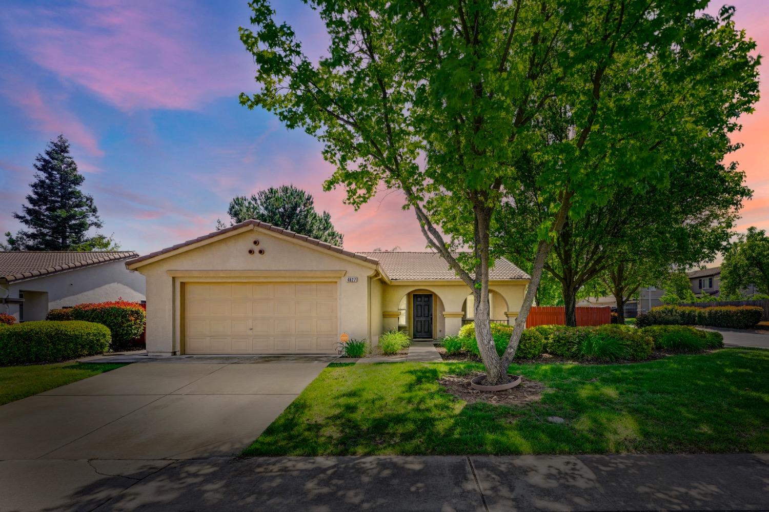 4627 Excelsior Road Mather, CA 95655 - Photo 1 of 33 a front view of a house with a garden