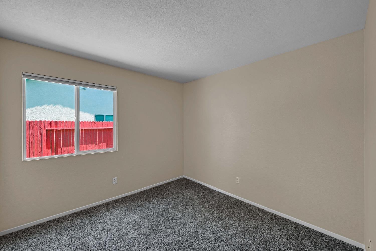 4627 Excelsior Road Mather, CA 95655 - Photo 22 of 33 an empty room with a window