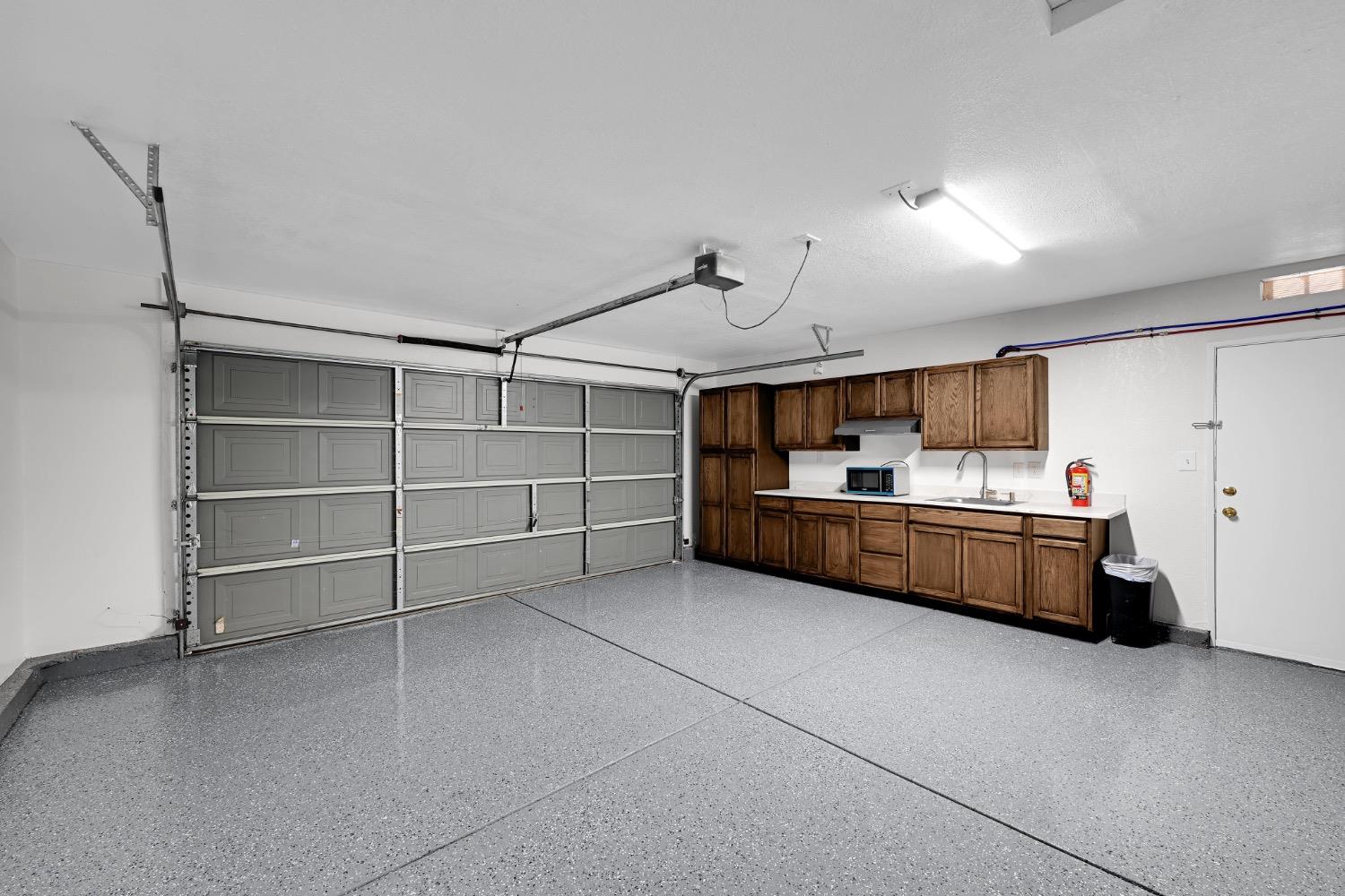 4627 Excelsior Road Mather, CA 95655 - Photo 26 of 33 a view of an empty room with cabinet and windows