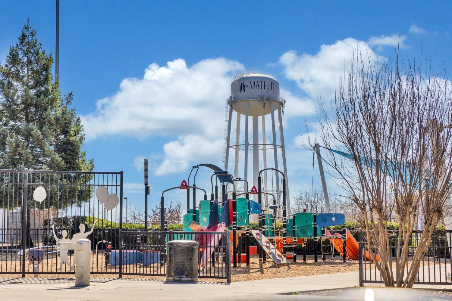 4627 Excelsior Road Mather, CA 95655 - Photo 33 of 33 a group of cars parked in front of building