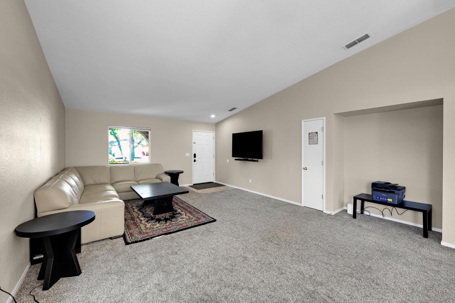 4627 Excelsior Road Mather, CA 95655 - Photo 9 of 33 a living room with furniture and a flat screen tv