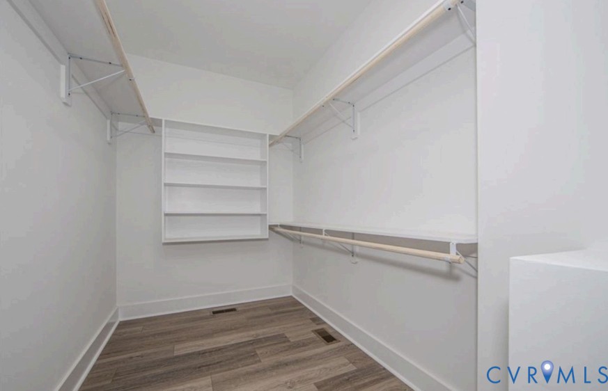115 Jenkins Church Road Cumberland, VA 23040 - Photo 10 of 16 Walk-in closet with wood-finish flooring, built-in