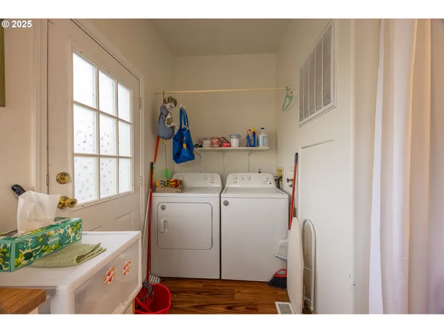 a utility room with dryer and washer