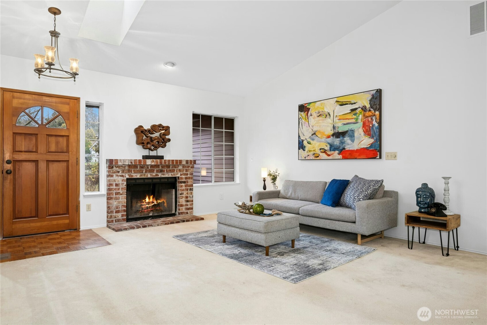 26603 199th Place Southeast Covington, WA 98042 - Photo 1 of 36 a living room with furniture and a fireplace