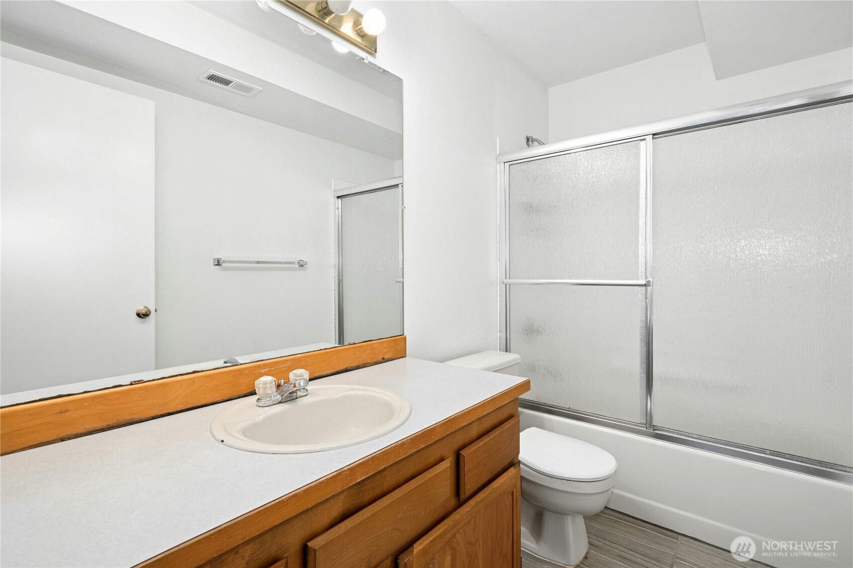26603 199th Place Southeast Covington, WA 98042 - Photo 25 of 36 a bathroom with a sink toilet and shower