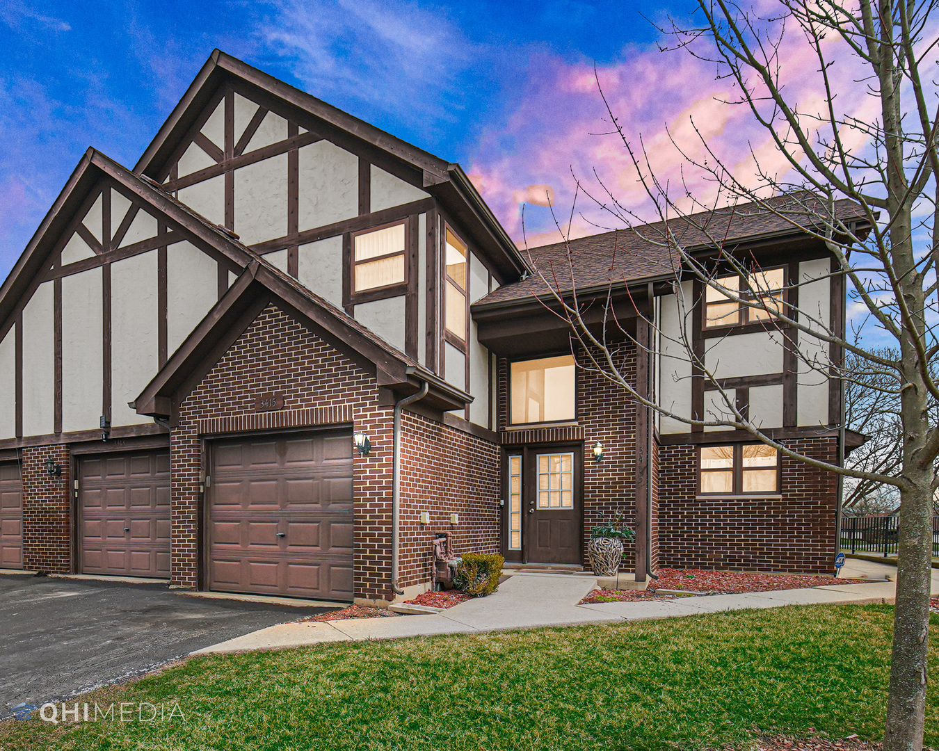 3415 Huntley Terrace, Unit D Crete, IL 60417 - Photo 1 of 22 a view of a house with a yard and wooden fence