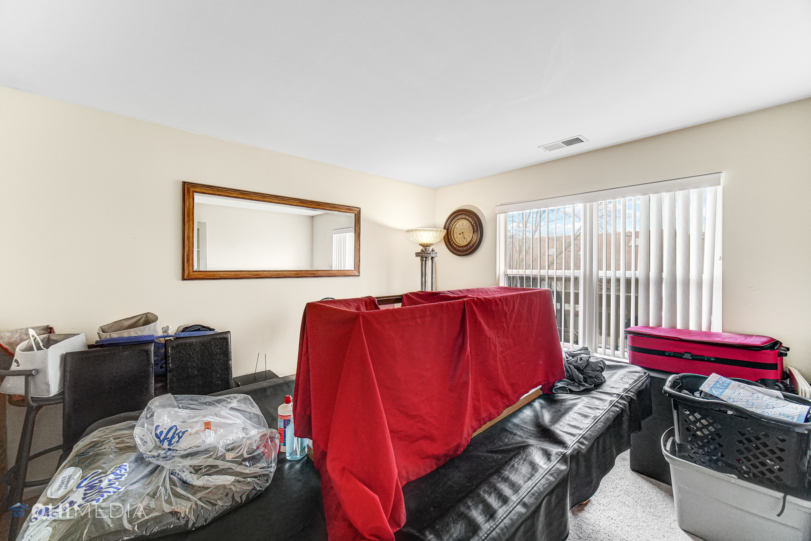 3415 Huntley Terrace, Unit D Crete, IL 60417 - Photo 12 of 22 a living room with furniture and a window
