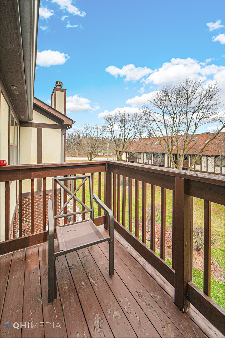 3415 Huntley Terrace, Unit D Crete, IL 60417 - Photo 20 of 22 a view of a street from a balcony