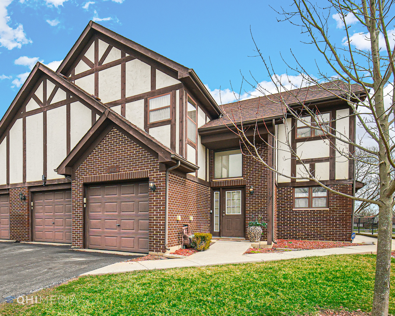 3415 Huntley Terrace, Unit D Crete, IL 60417 - Photo 2 of 22 a front view of a house with yard and seating area