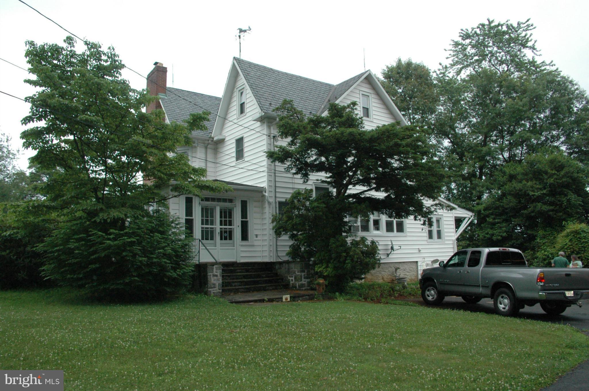 3923 Street Road Street, MD 21154 - Photo 2 of 7 a view of a house with a back yard