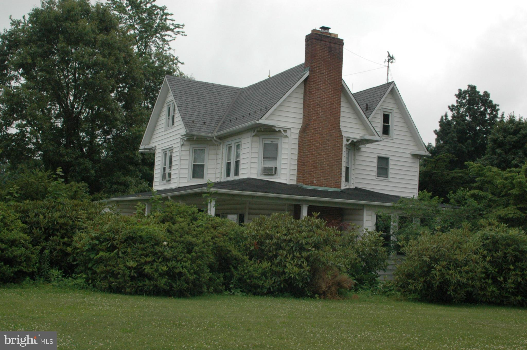 3923 Street Road Street, MD 21154 - Photo 5 of 7 a front view of a house with a yard
