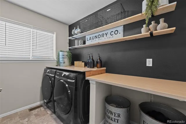 a spacious bedroom with a bed and window