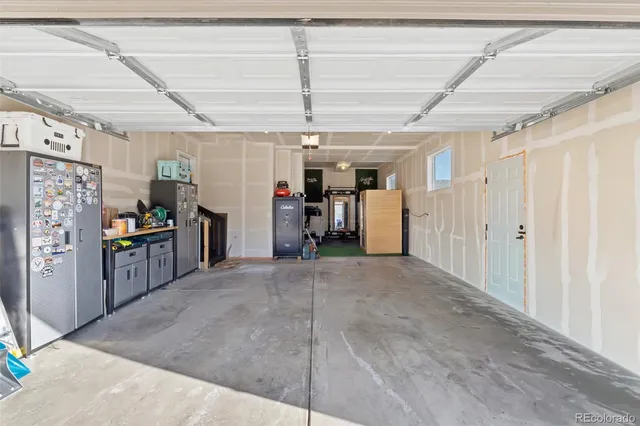 an aerial view of a house with a swimming pool