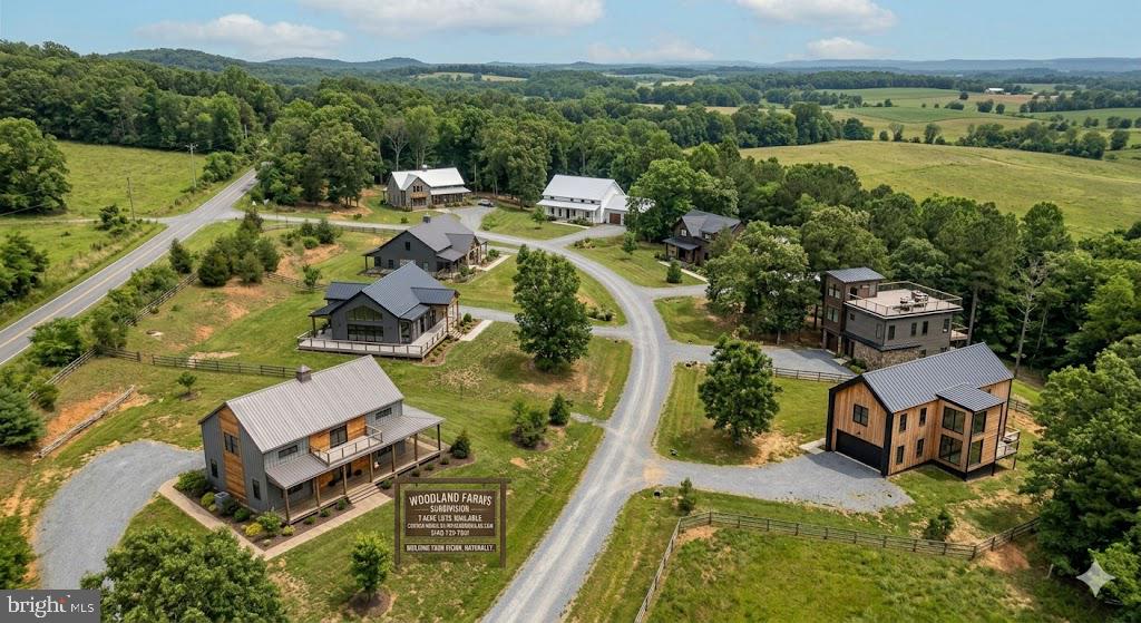 16080 Newbys Shop Road Elkwood, VA 22718 - Photo 20 of 21 an aerial view of a house with a garden and lake view