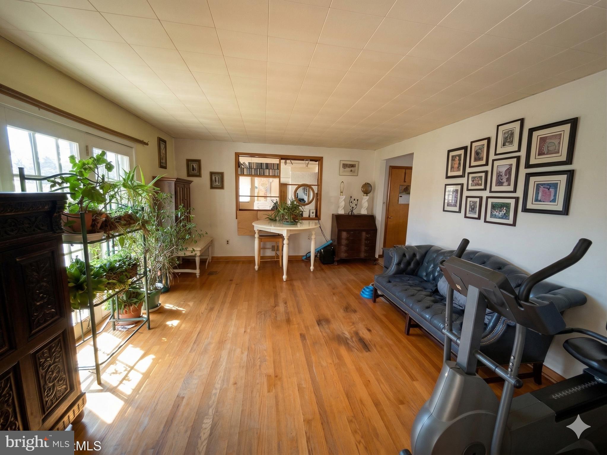 16080 Newbys Shop Road Elkwood, VA 22718 - Photo 6 of 21 a living room with furniture and wooden floor