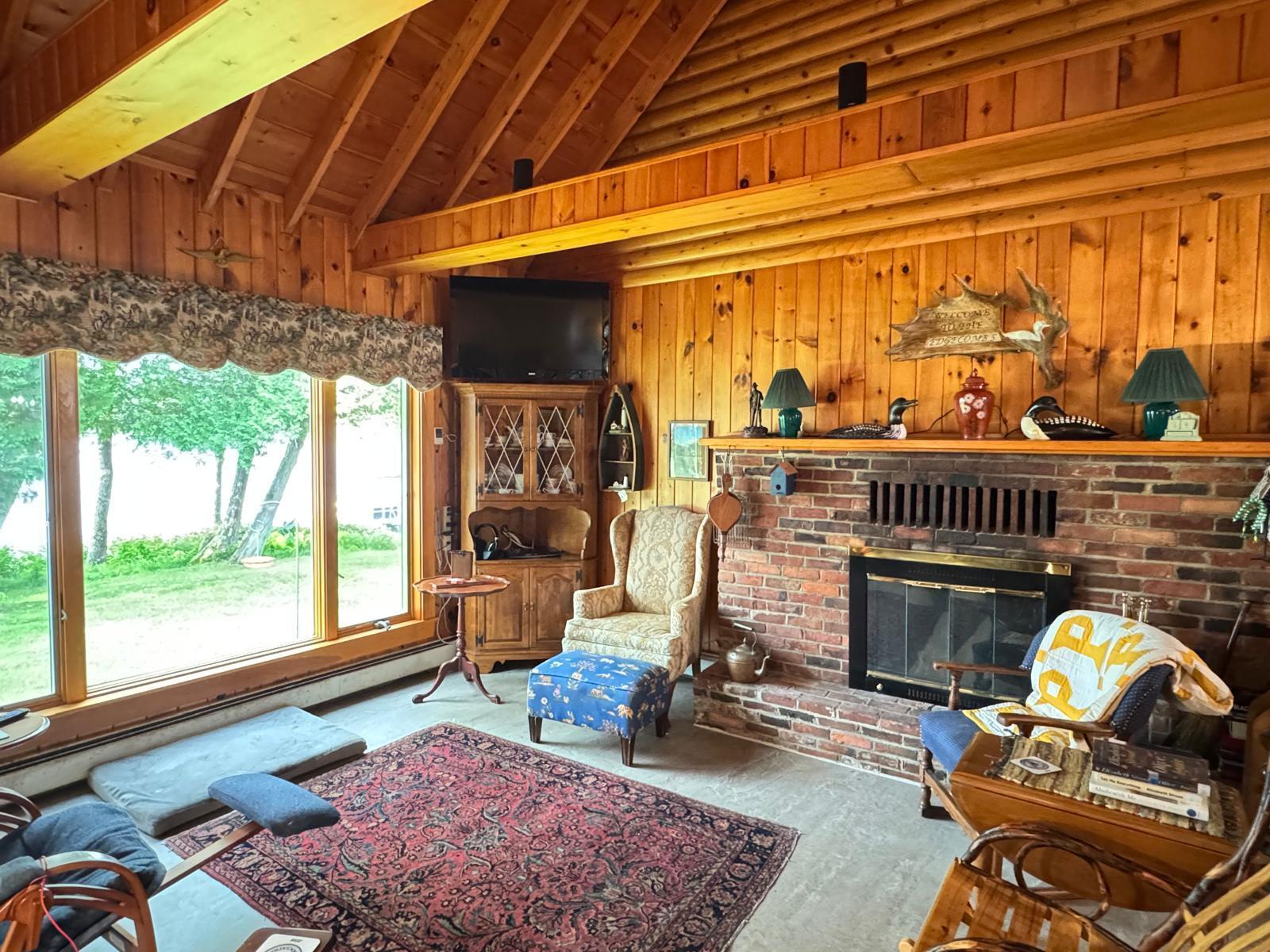 736 W Road Portage Lake, ME 04768 - Photo 14 of 30 Living Room