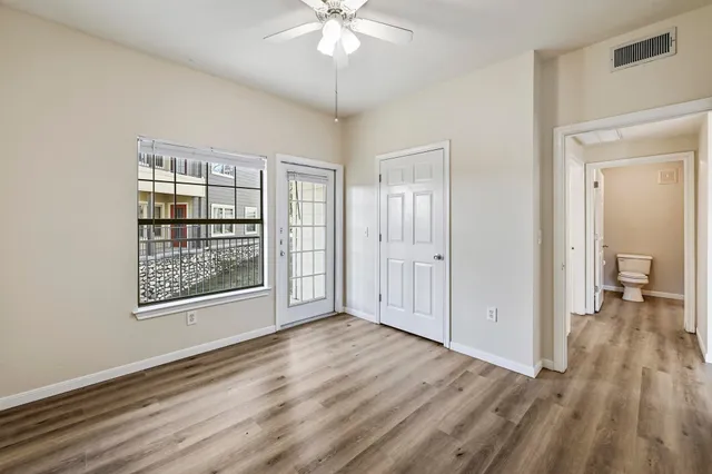 a view of a room with racks on the wall