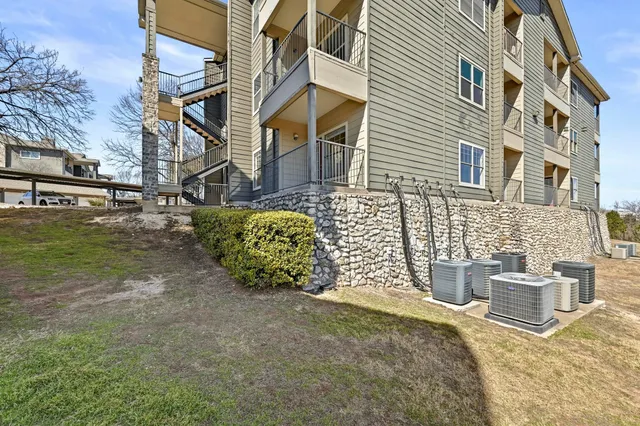 a view of pool with outdoor seating