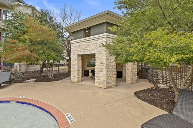 a house with tree in front of it