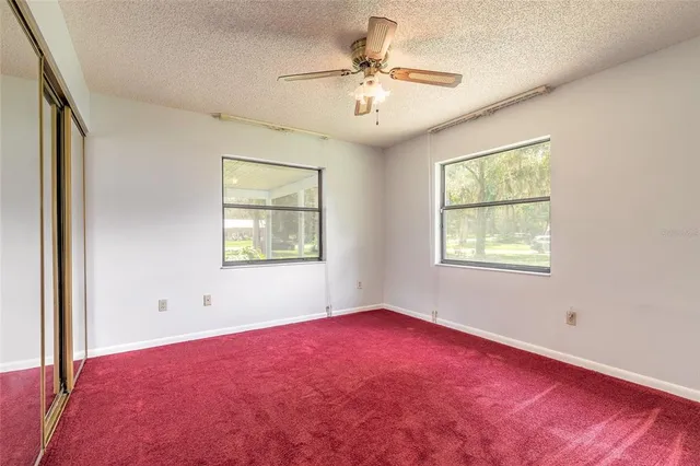 a view of a swimming pool and an outdoor space