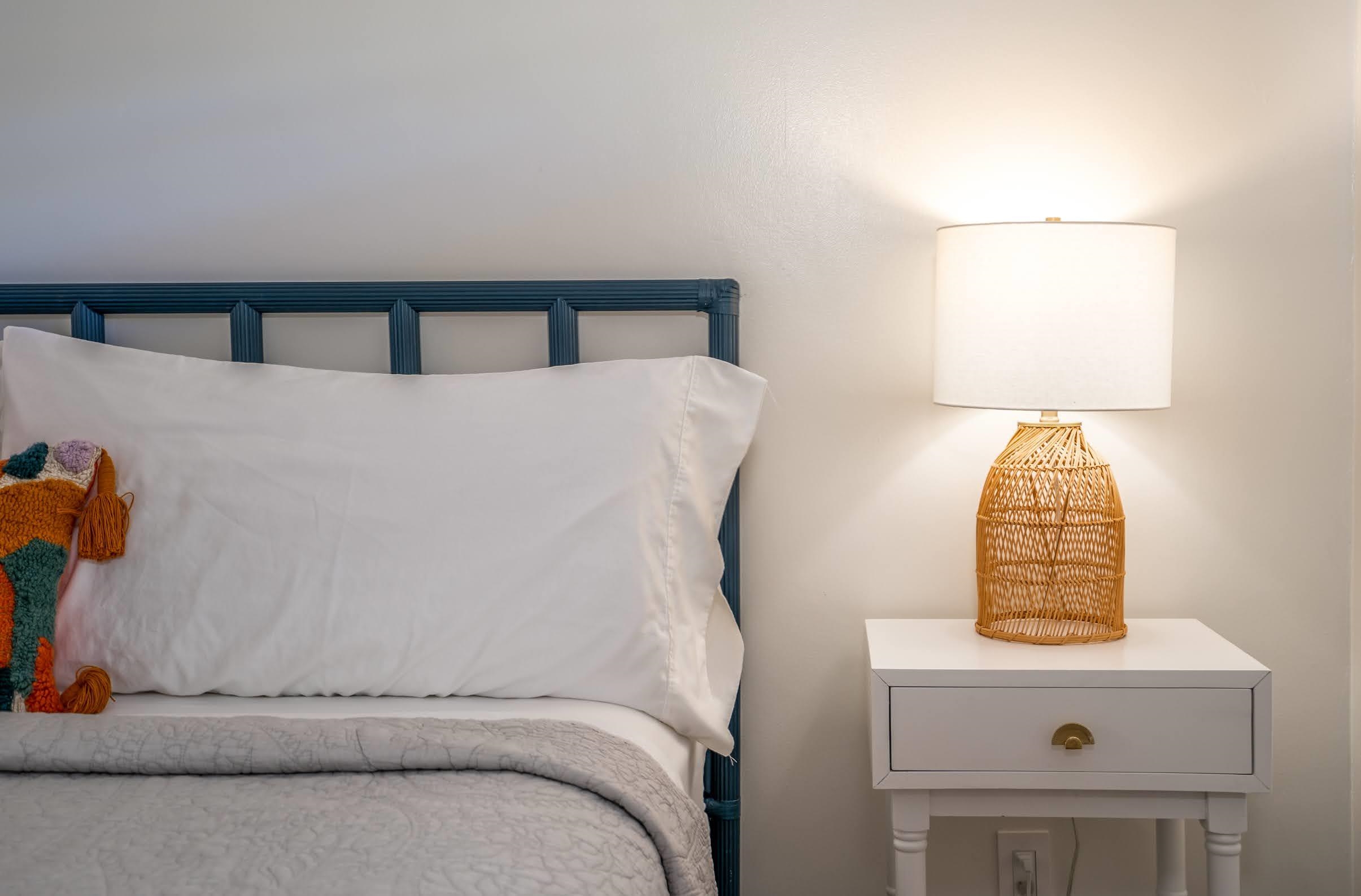 145 North Kihei Road, Unit 103 Kihei, HI 96753 - Photo 18 of 49 a bedroom with a bed and a window