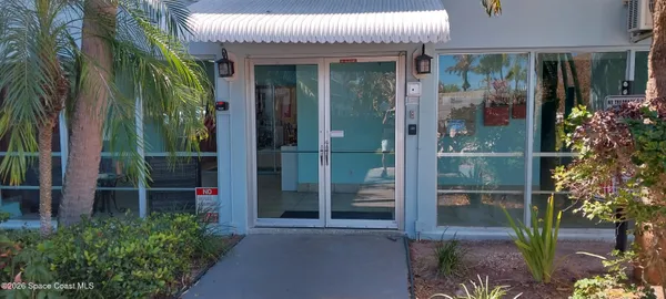 front view of a house with a glass door