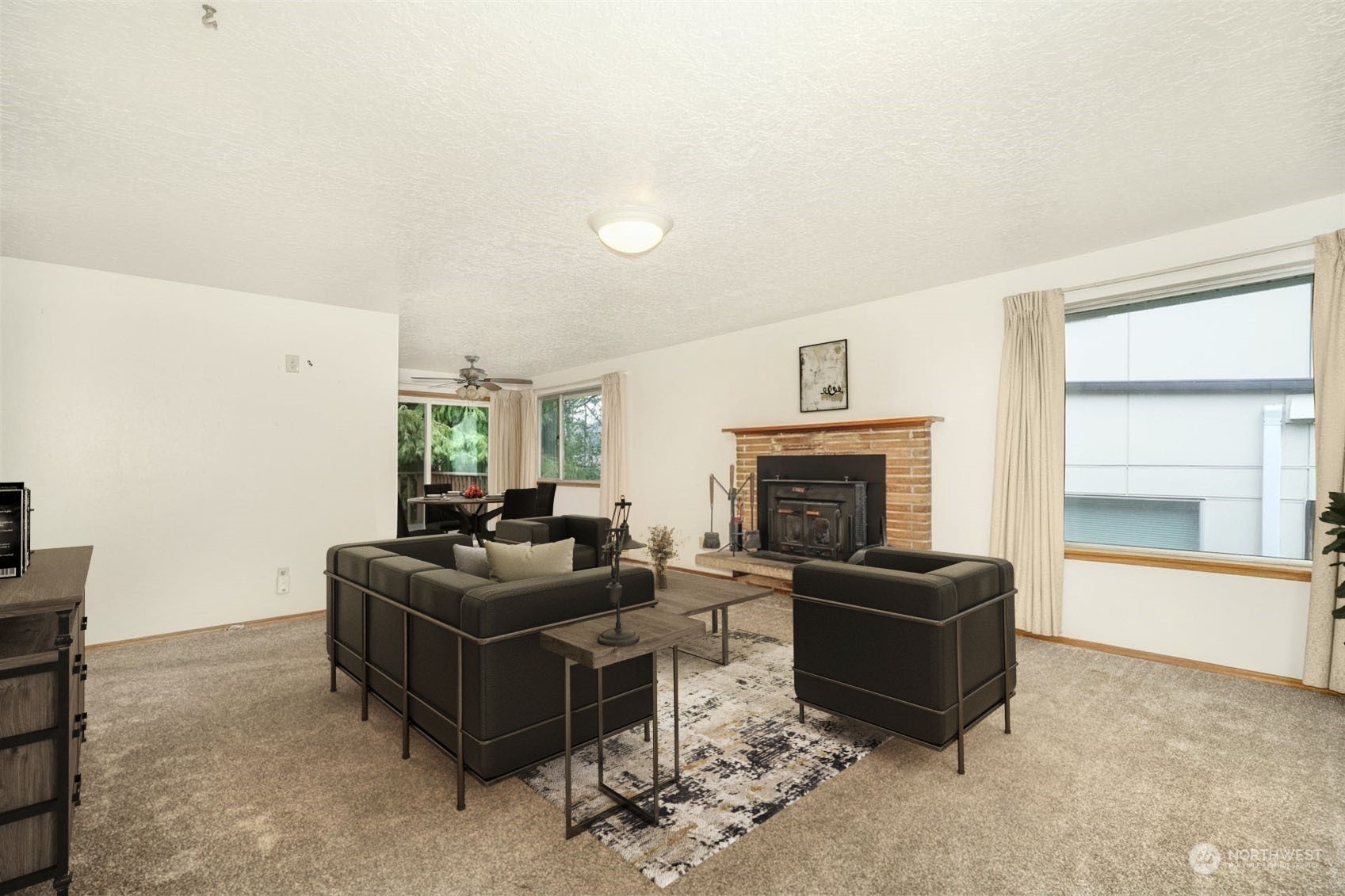 4151 23rd Avenue Southwest Seattle, WA 98106 - Photo 5 of 36 a living room with furniture and a fireplace