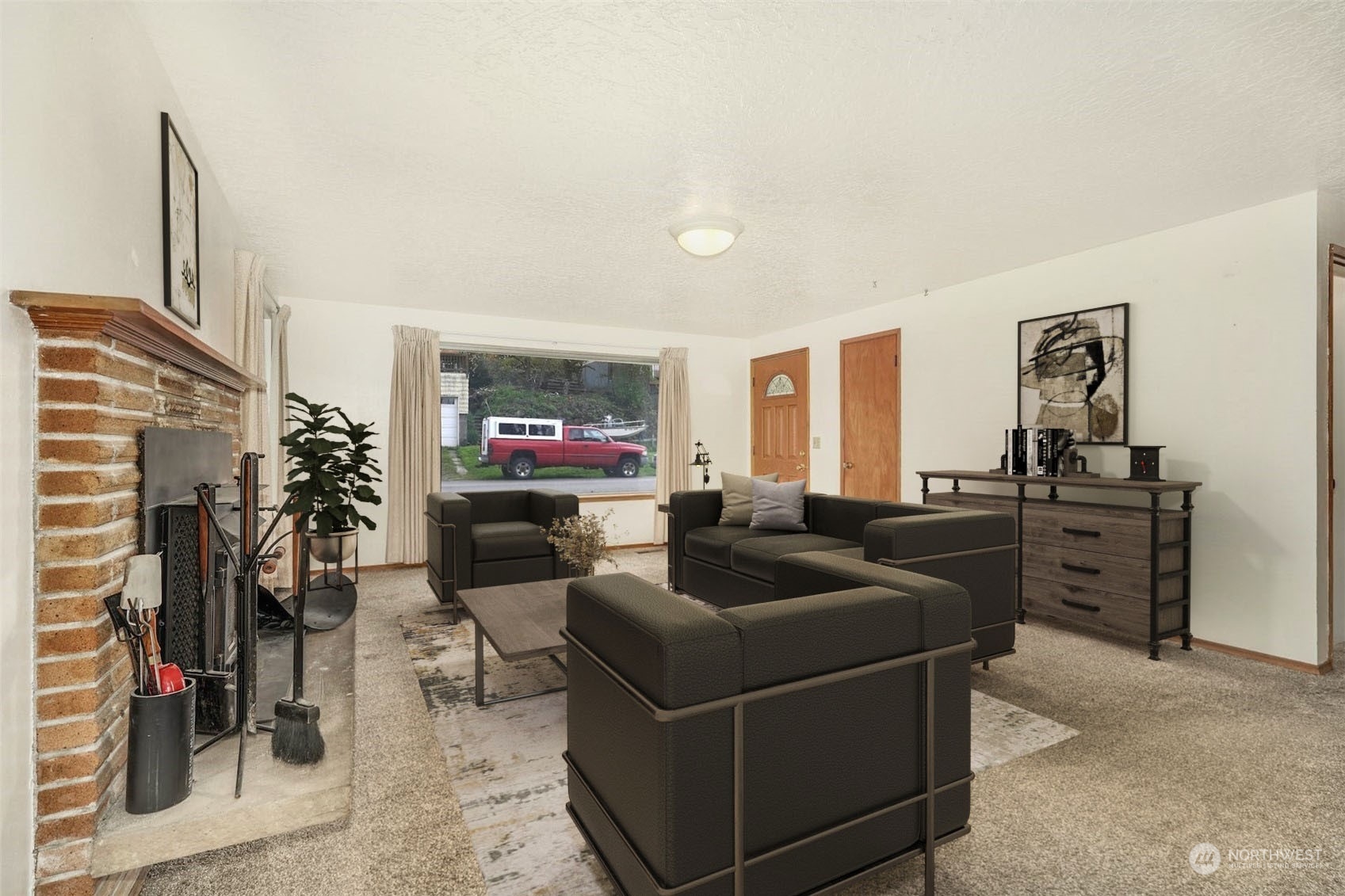 4151 23rd Avenue Southwest Seattle, WA 98106 - Photo 7 of 36 a living room with furniture and a flat screen tv