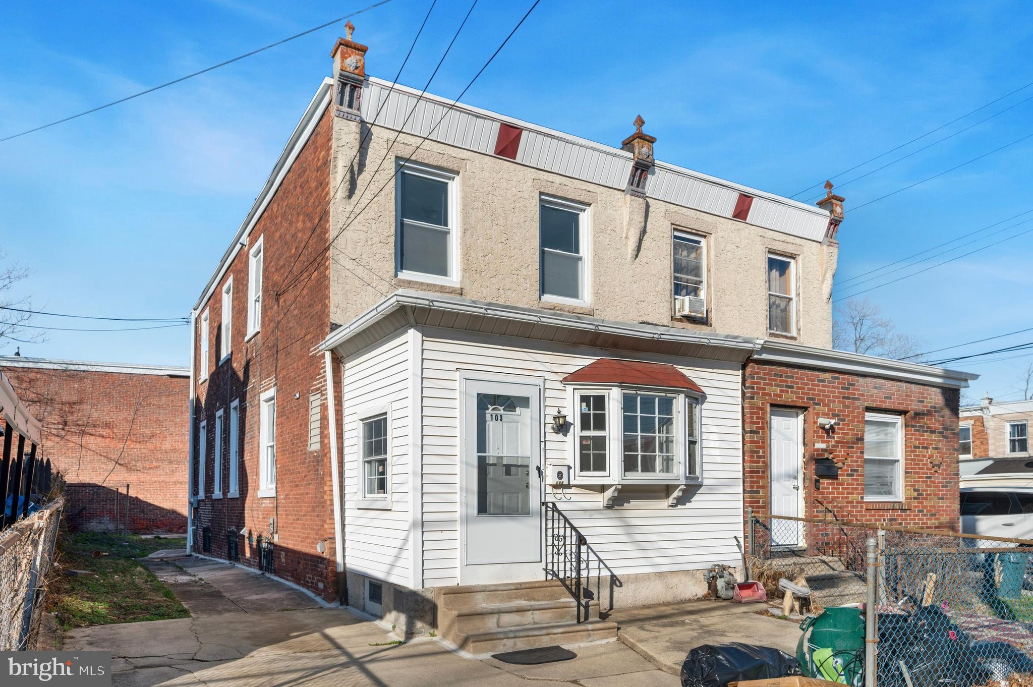 Front of home and view of driveway to the left