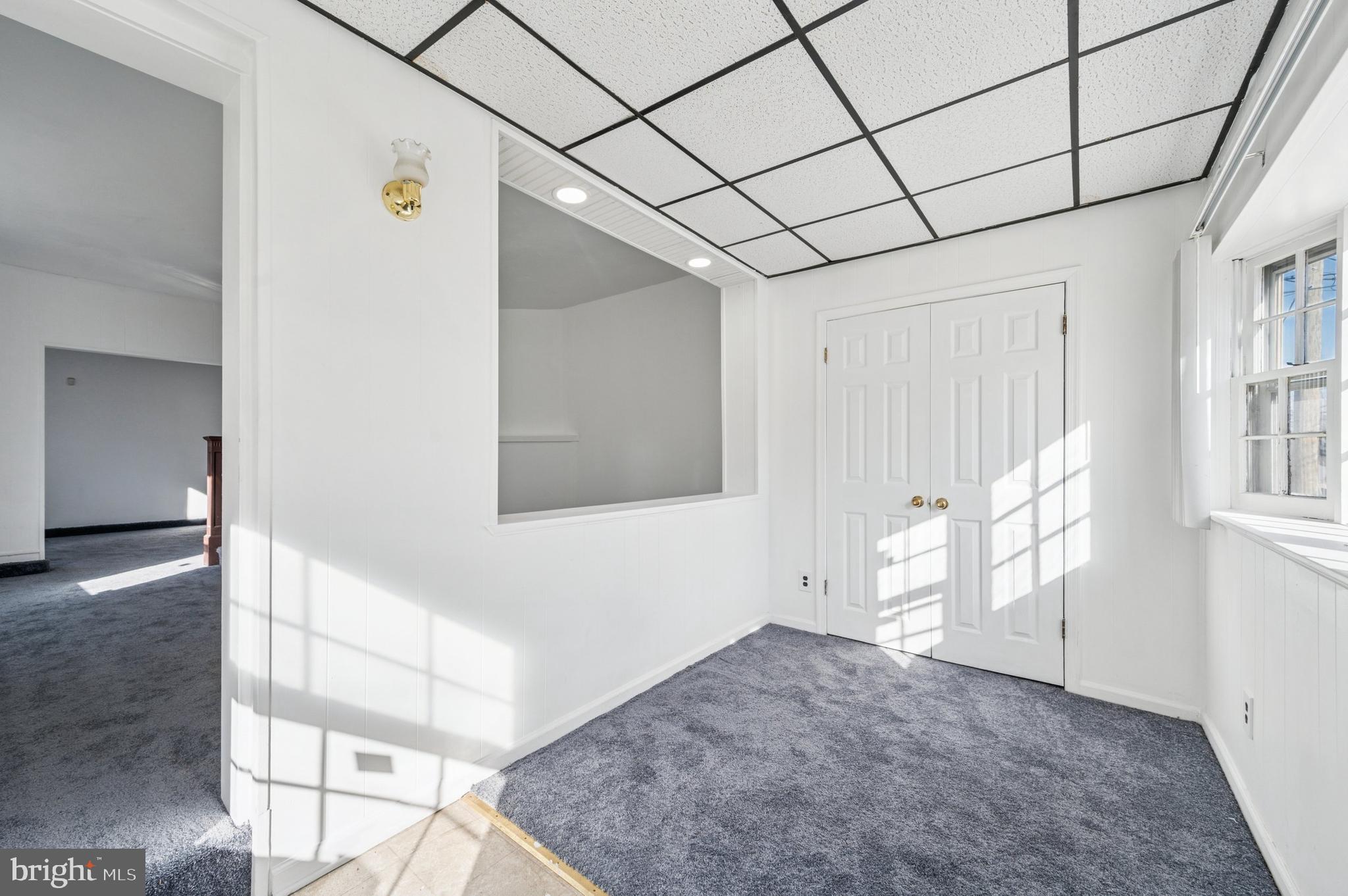 103 Chestnut Street Darby, PA 19023 - Photo 2 of 15 Enclosed Porch with coat closet