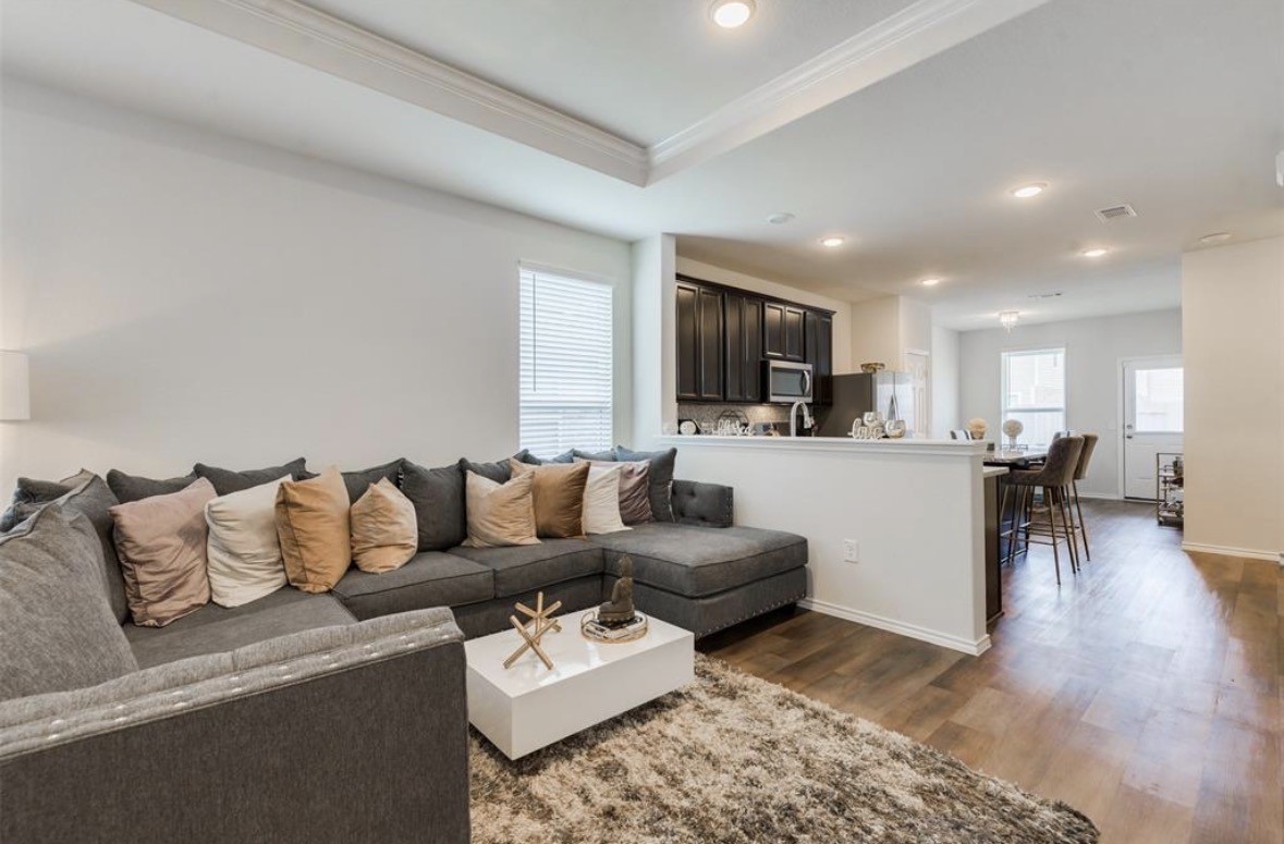 25535 Pitchfork Ranch Place Katy, TX 77493 - Photo 21 of 25 a living room with furniture and view of kitchen