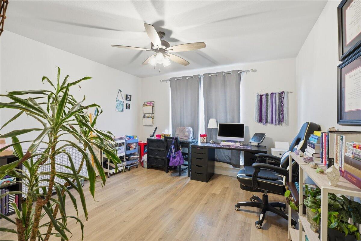 7416 30th Street Lubbock, TX 79407 - Photo 24 of 31 a workspace with furniture