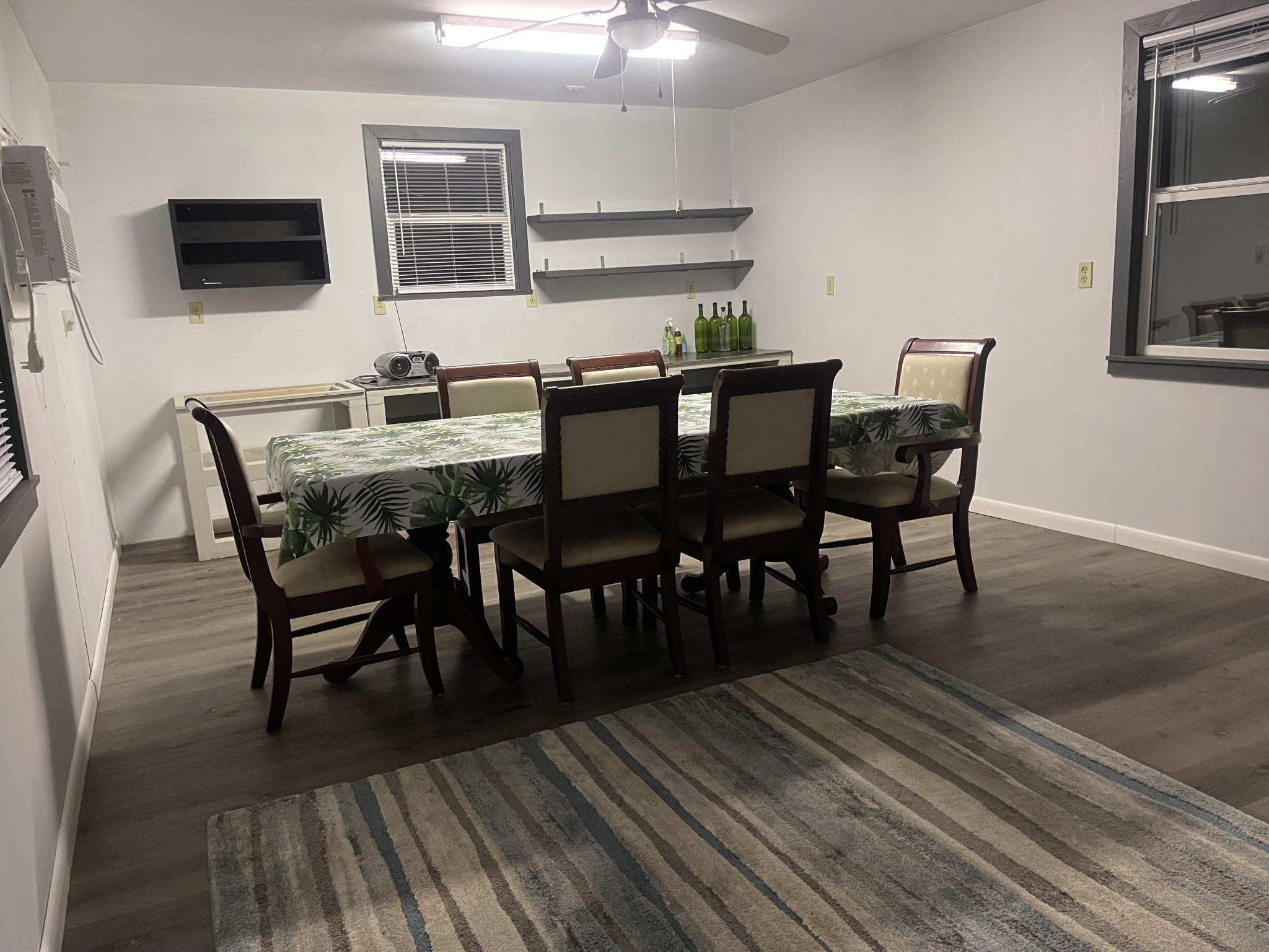 7690 Barnhill Road Primm Springs, TN 38476 - Photo 38 of 50 a view of a dining room with furniture and wooden floor