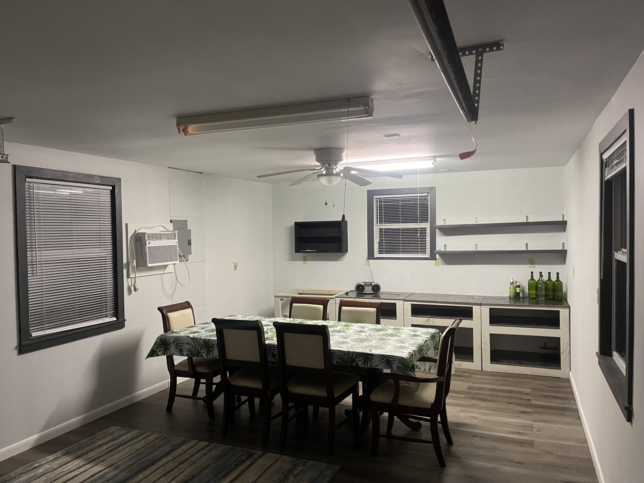 7690 Barnhill Road Primm Springs, TN 38476 - Photo 40 of 50 a view of a dining room with furniture and wooden floor